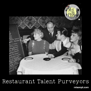 House ad: vintage photo of a party gathered around a dinner table